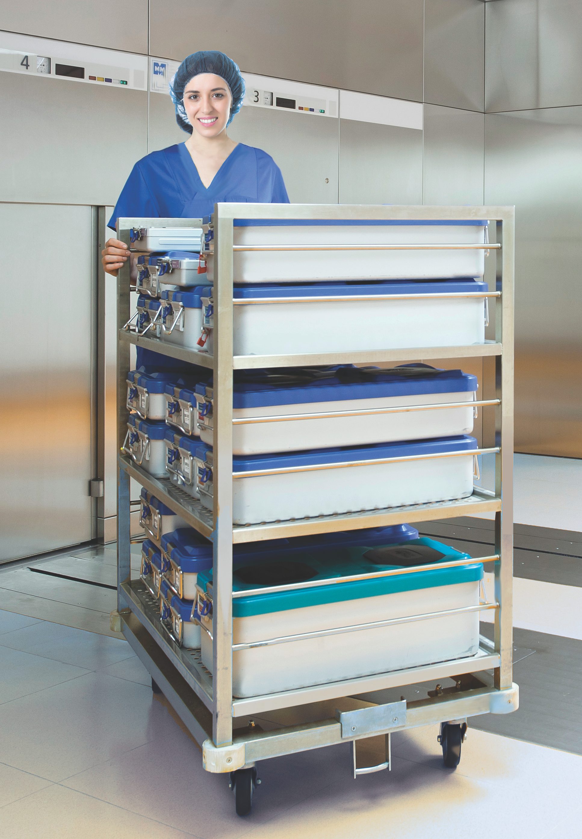 Woman in scrubs pushing cart with sterile containers