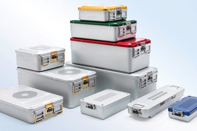 Group of various sizes and styles of Aesculap SterilContainers™ 